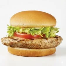 Dairy Queen Grilled Chicken Sandwich with tender grilled chicken fillet fresh lettuce tomato and mayo on a toasted bun