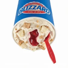 Dairy Queen Royal New York Cheesecake Blizzard Treat with cheesecake chunks graham crust and strawberry center